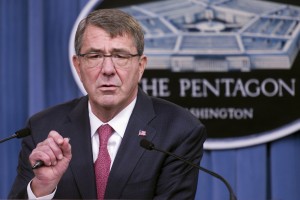 Defense Secretary Ash Carter gestures during a news conference at the Pentagon, Thursday, Dec. 3, 2015, where he announced that he has ordered the military to open all combat jobs to women, and is giving the armed services until Jan. 1 to submit plans to make the historic change. (AP Photo/Cliff Owen)