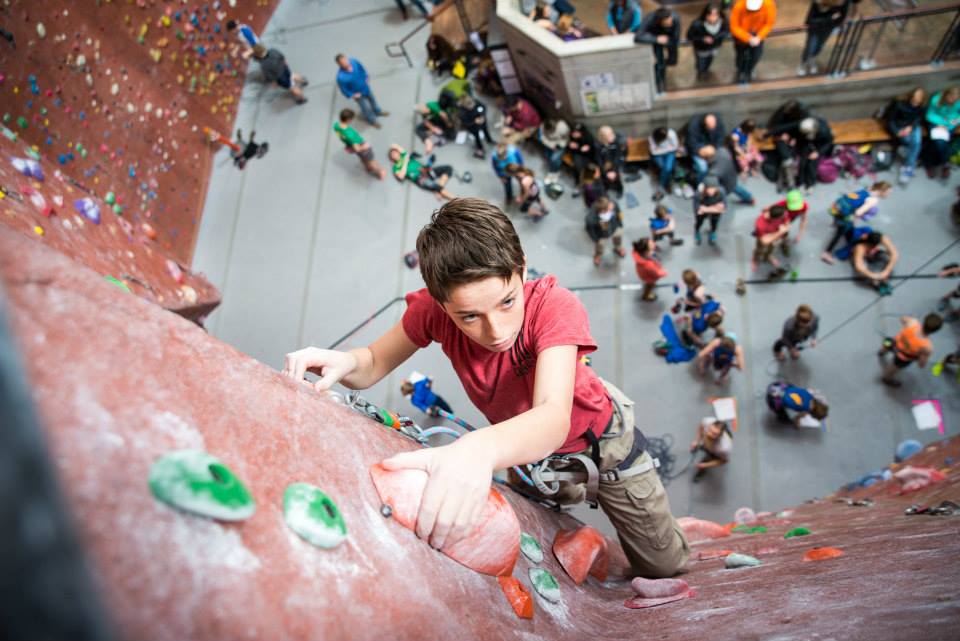 Devin Ashcraft reaches the top of a lead climbing wall at the Quarry. The indoor climbing industry grew by ten percent in 2015. (Ashcraft) 