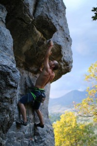 Matt Rossi, an employee at the Quarry, climbs outdoors. Climbing gyms help beginners get the courage to climb outdoors. (Cameron Lusvardi) 