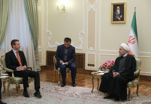 In this photo released by the official website of the office of the Iranian Presidency, Iran's President Hassan Rouhani, right, speaks with Danish Foreign Minister Kristian Jensen during their meeting in Tehran, Iran, Tuesday, Jan. 5, 2016. Iran's president said on Tuesday that Saudi Arabia cannot "cover up" its crime of executing a leading Shiite cleric by severing diplomatic relations with the Islamic Republic, even as the kingdom's allies began limiting their links to his country. (Iranian Presidency Office via AP)