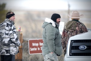Protesters roam the Malheur National Wildlife headquarters in Burns, Ore., on Sunday, Jan 3, 2016. Armed protesters took over the Malheur National Wildlife Refuge on Saturday after participating in a peaceful rally over the prison sentences of local ranchers Dwight and Steven Hammond. The decision to send the man back to prison generated controversy and is part of a decades-long dispute between some Westerners and the federal government over the use of public lands. (Mark Graves/The Oregonian via AP)