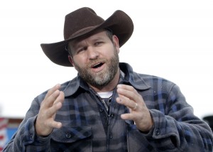 FILE - In a Tuesday, Jan. 5, 2016 file photo, Ammon Bundy speaks during an interview at Malheur National Wildlife Refuge, near Burns, Ore. Authorities said Tuesday, Jan. 26, 2016, that Bundy, leader of the armed Oregon group, has been arrested. Authorities say shots were fired during the arrest of members of an armed group that has occupied a national wildlife refuge in Oregon for more than three weeks. The FBI said authorities arrested Ammon Bundy, 40, his brother Ryan Bundy, 43, Brian Cavalier, 44, Shawna Cox, 59, and Ryan Payne, 32, during a traffic stop on U.S. Highway 395 Tuesday afternoon. (AP Photo/Rick Bowmer, File)