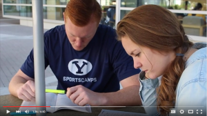 Evan Clinger and fiancee Hanah Belnap study in a scene from a YouTube video discussing the impact of student loan debt in their relationship. (Cassie Arntsen)
