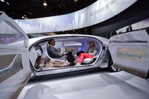 FILE - In this January, 2015 file photo, attendees sit in the self-driving Mercedes-Benz F 015 concept car at the Mercedes-Benz booth at the International CES in Las Vegas. While self-driving cars of tomorrow already are being tested on public roads, newly released safety data support the cautionary view that the technology has many miles to go. That doesn’t mean relief is decades away. It’s possible that within a few years, mainstream cars will drive themselves reliably - on routes they have mastered, in weather they can handle. And with a person ready to grab the wheel.(AP Photo/Jae C. Hong, File) 