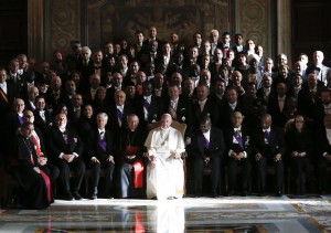 Pope Francis poses for a family photo with ambassadors during his annual audience with diplomats, at the Vatican, Monday, Jan. 11, 2016. (Alessandro Bianchi/Pool Photo via AP)