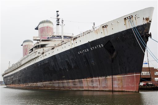 FILE -In this Nov. 22, 2013, file photo, the SS United States sits moored in Philadelphia. Officials of the Crystal Cruises luxury travel company held a news conference Thursday, Feb. 4, 2016 to announce plans to overhaul the SS United States at a cost of at least $700 million. (AP Photo/Matt Rourke, File)
