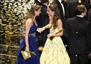 Brie Larson, best actress winner for "Room," left, and Alicia Vikander, winner of the best supporting actress award for "The Danish Girl," congratulate each other on stage at the conclusion of the show at the Oscars on Sunday, Feb. 28, 2016, at the Dolby Theatre in Los Angeles. (Photo by Chris Pizzello/Invision/AP)