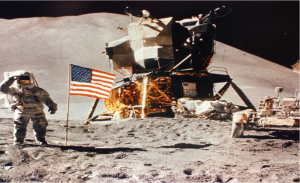 Snapped from space, an astronaut and the lunar rover. Conover helped engineer the navigation system. 