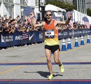Jared Ward finishing the LA Marathon. Ward came in third place and qualified for the Olympics. (Twitter/@TaFphoto)