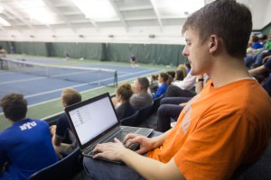 Engineering student Ben Olvera gets paid to record the stats and scores for BYU men's tennis. (Natalie Bothwell)