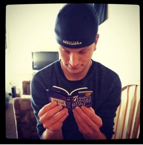Darren Walker reading his mini textbook ordered online. (Darren Walker) 