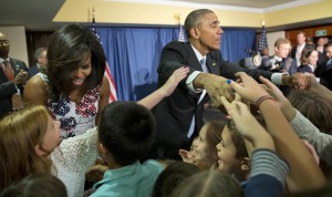 President Barack Obama and first lady Michelle Obama greet children and families of U.S. embassy personnel during an event at the Melia Habana Hotel in Havana, Cuba, Sunday, March 20, 2016. Obama's trip is a crowning moment in his and Cuban President Raul Castro's ambitious effort to restore normal relations between their countries. (Associated Press)