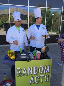 Will Rubio and Aaron Woodall prepare breakfast for sleeping students on BYU campus. (Random Acts)