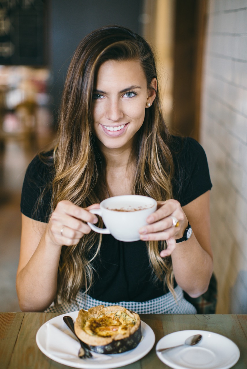 Female Foodie Brooke Eliason enjoying a cup of hot chocolate at a local diner. (Whitney Brailsford)