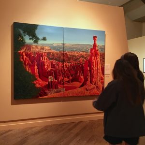 BYU Museum of Art visitors view Anton J. Rasmussen's painting of Bryce Canyon. (Jennifer Ball)