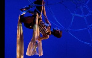 Meg Flinders performs the role of Charlotte on aerial silks (Department of Theater and Media Arts)