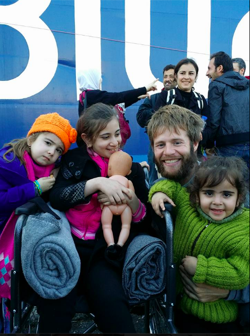 Adam Paul Steed with Syrian children at a refugee camp in Greece. (Adam Paul Steed)