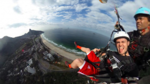 Johnny Neu hang gliding over Rio where he will be taking NBC clients (Johnny Neu)