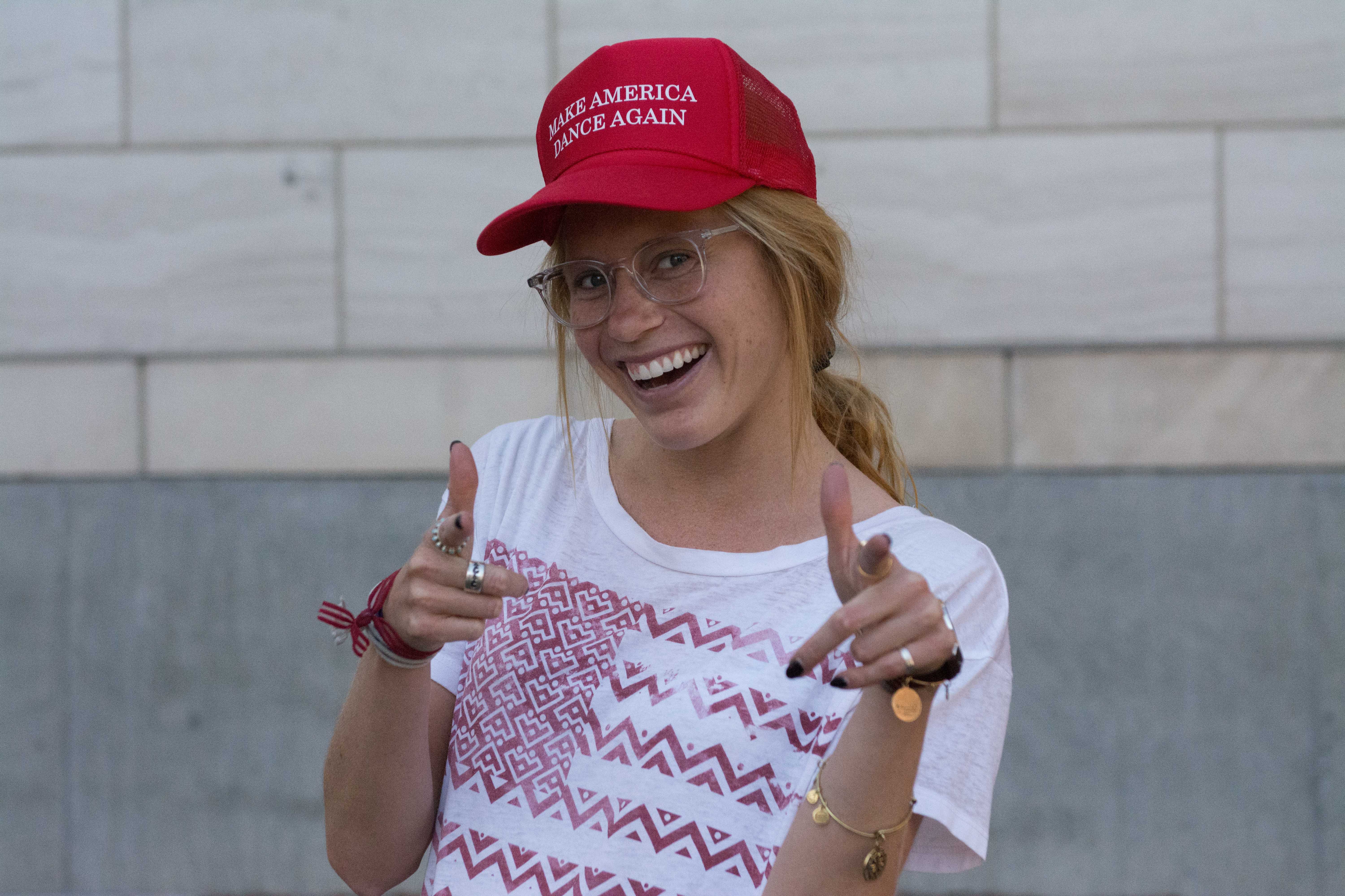 Public relations major Megan Bertha, from California, wore patriotic colors and a "Make America Dance Again" hat on the day after the election. (Ryan Turner)
