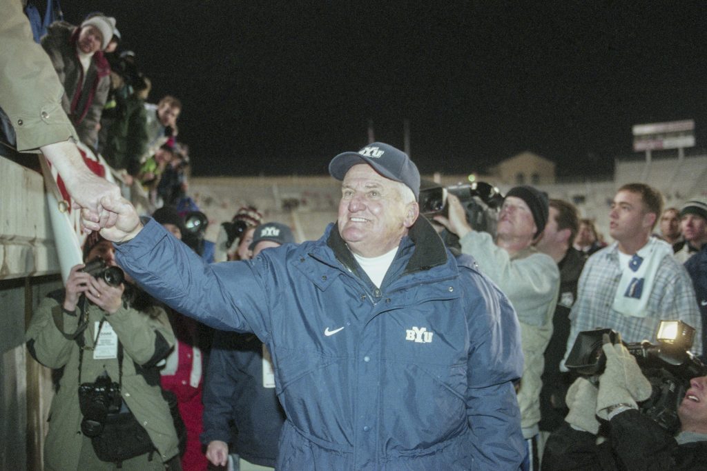 LaVell Edwards walks off the field at Rice Eccles Stadium after his final game. The Cougars won 34-27. (BYU Photo)