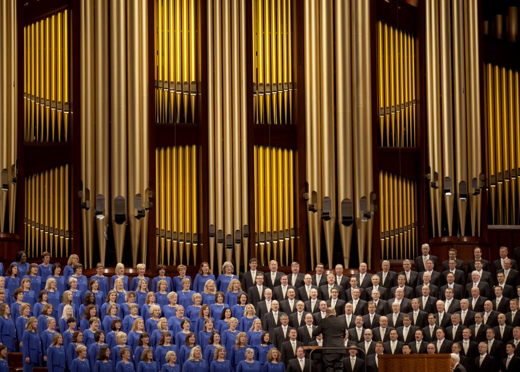 FILE - In this Oct. 3, 2015 file photo, The Mormon Tabernacle Choir sings during the opening session of the two-day Mormon church conference in Salt Lake City. The church announced on its website Thursday that the 360-member volunteer choir will sing at Trump’s swearing-in ceremony on January 20. (AP Photo/Kim Raff)