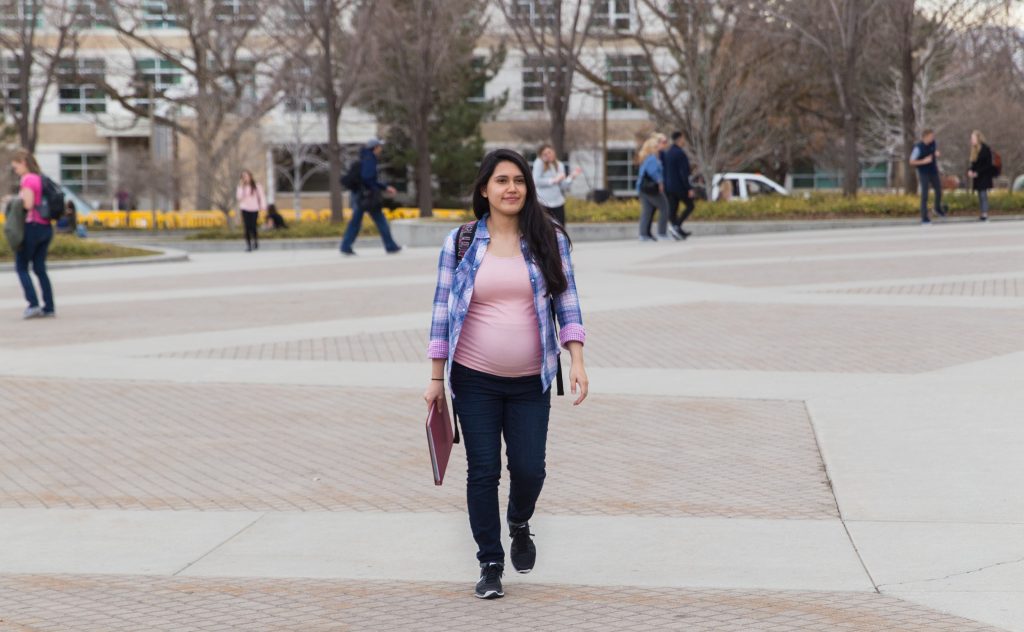 BYU student Vanessa Bronovski works hard at balancing both school and her pregnancy. (Maddi Driggs) 