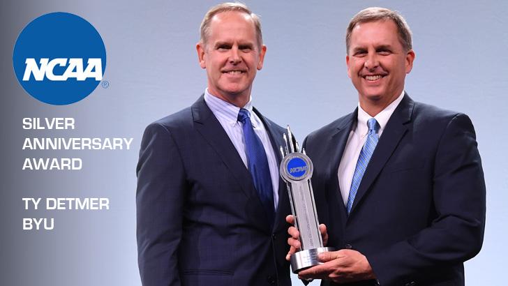 Ty Detmer poses with BYU athletic director Tom Holmoe after receiving the NCAA Silver Anniversary Award. (NCAA Photo)