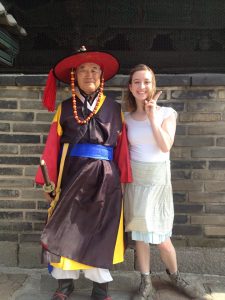 Madelyn Lunnen poses with a guard at a historical military base in South Korea. (Madelyn Lunnen)